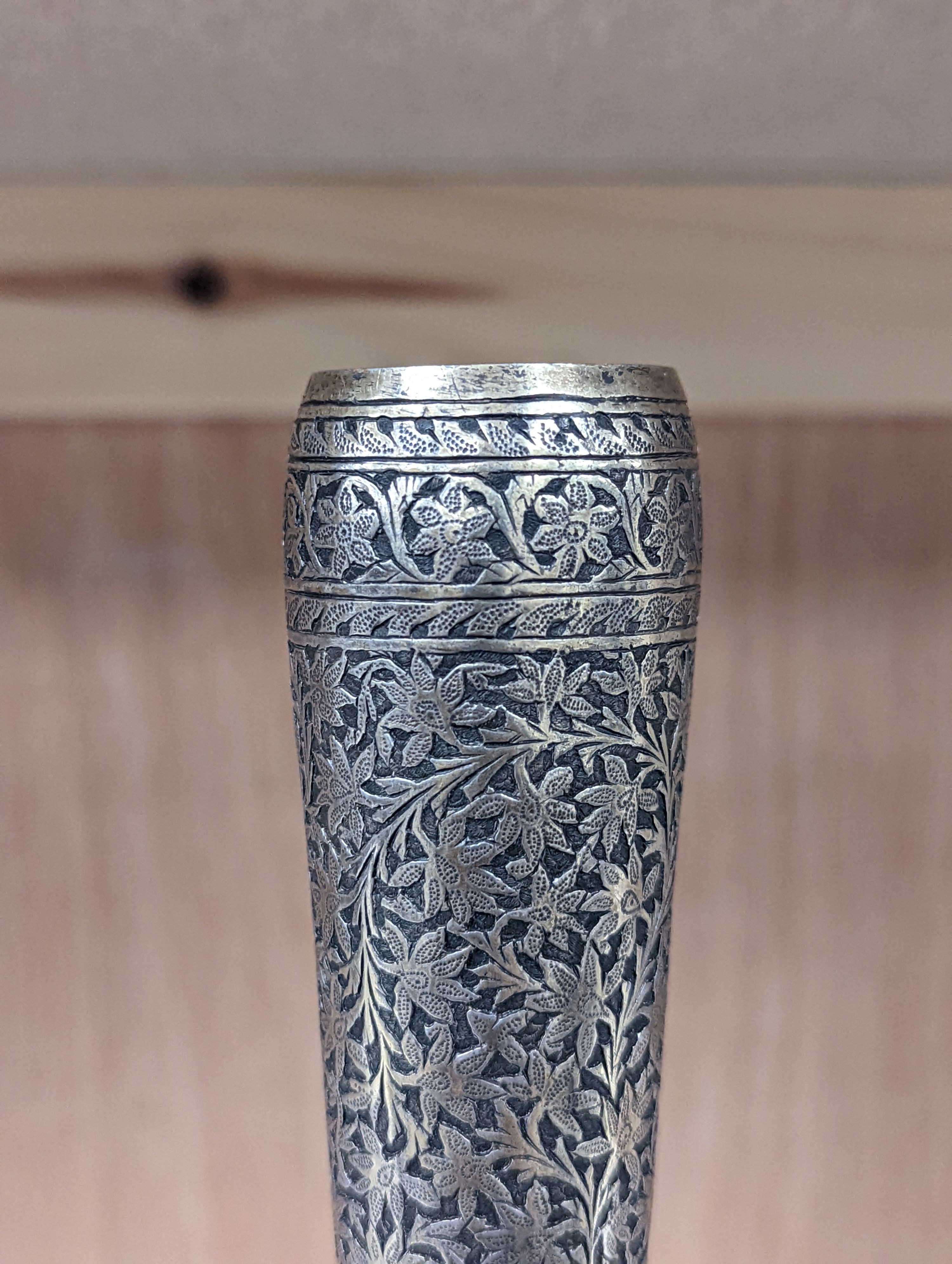 A 19th century North Indian silver surahi with engraved shawl decoration 30cm